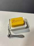 Butter clicker and knife